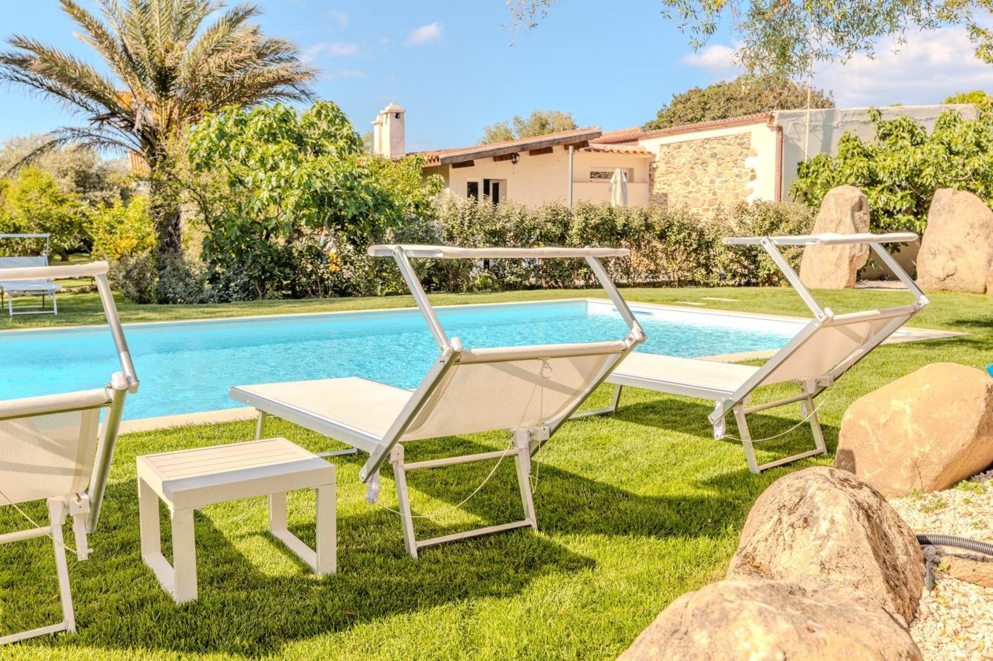 Apartamento Stazzo San Teodoro Piscina Condivisa Exterior foto