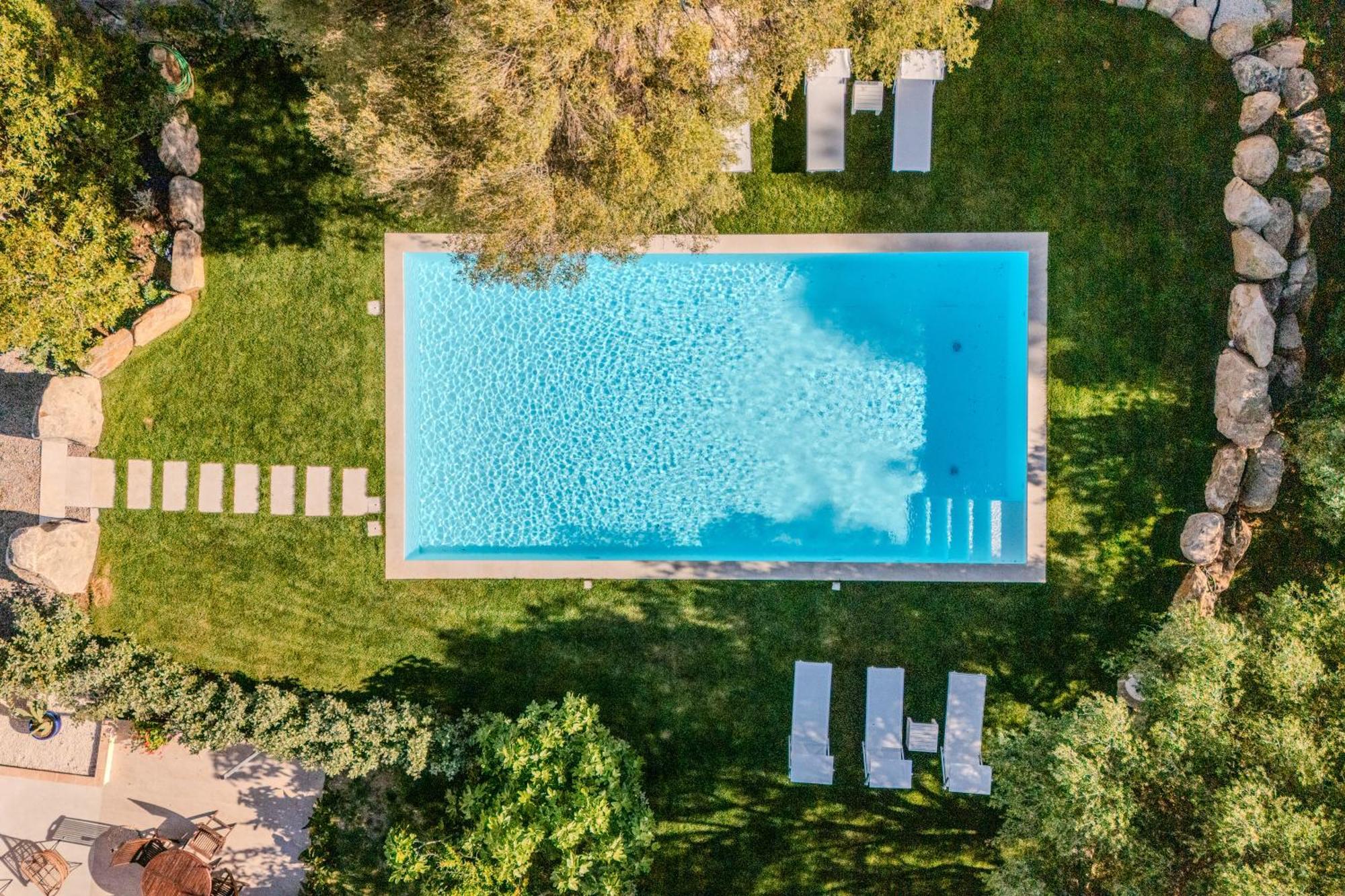 Apartamento Stazzo San Teodoro Piscina Condivisa Exterior foto